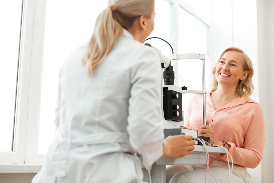 Eye doctor educating patient