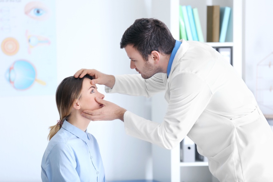 Eye doctor and patient